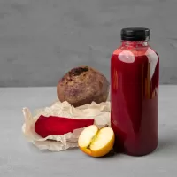 A bottle of cold pressed beet juice.
